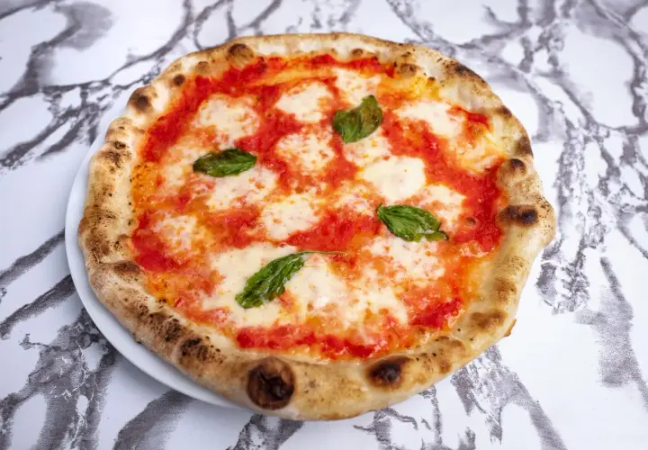 Ile sera na pizzę? Odpowiednia ilość dla idealnego smaku