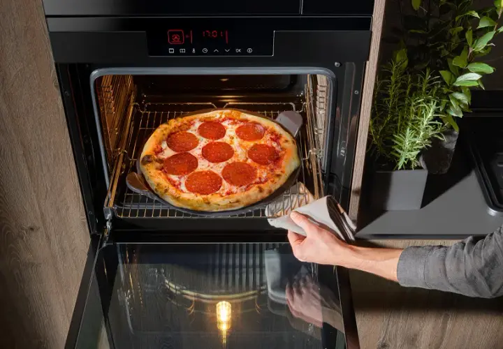 W jakiej temperaturze piec pizzę w piekarniku elektrycznym, aby była idealna?