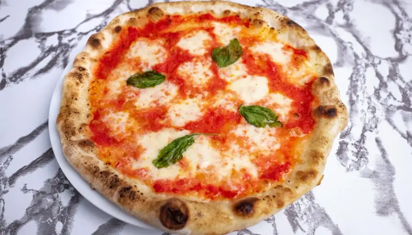 Ile sera na pizzę? Odpowiednia ilość dla idealnego smaku