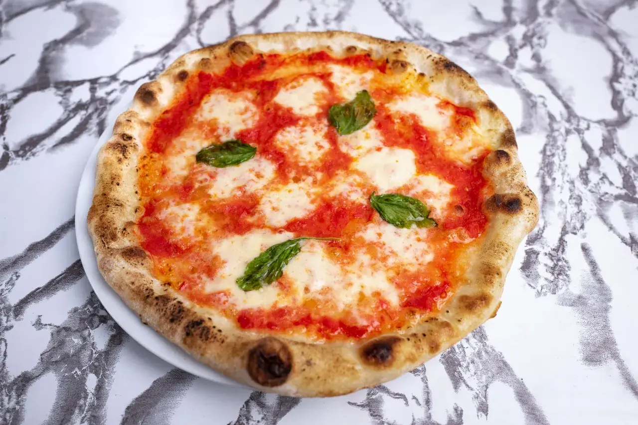 Ile sera na pizzę? Odpowiednia ilość dla idealnego smaku